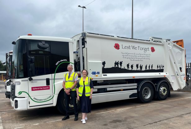 Lest we forget bin wagon with Alan Fitzsimons and Cllr Barbara Bentham stood in front of it